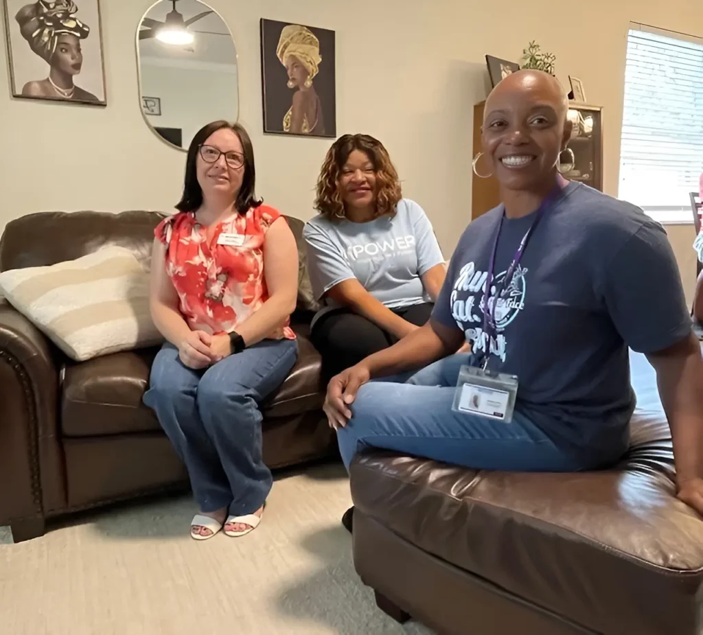 ImpowerFL mental health professionals and Host Homes staff providing supportive care and counseling services in a welcoming home environment